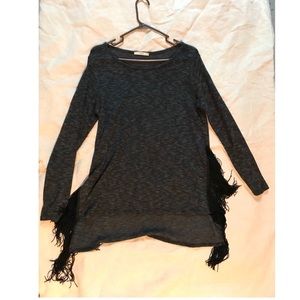 Black long sleeve fringe slit top